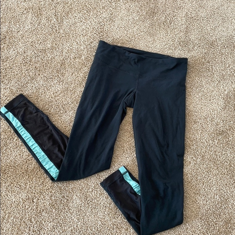Under Armour charcoal w aqua blue leggings damaged